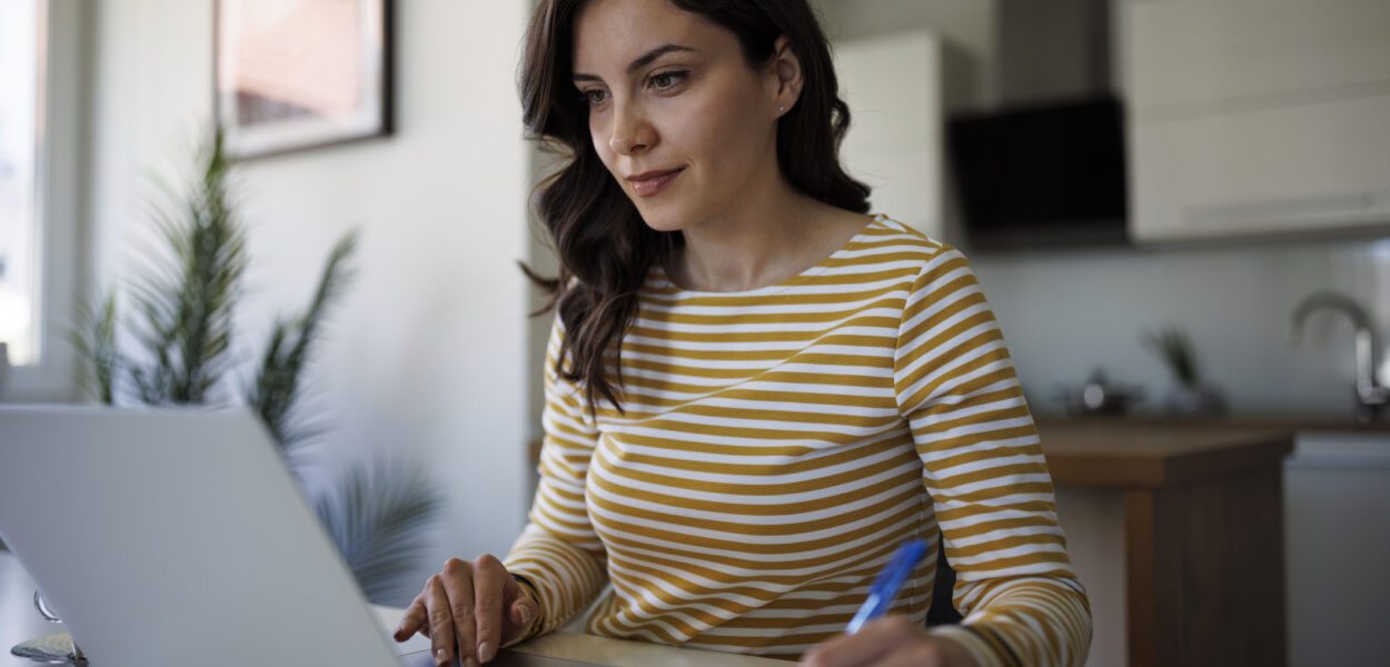 Young woman working at home