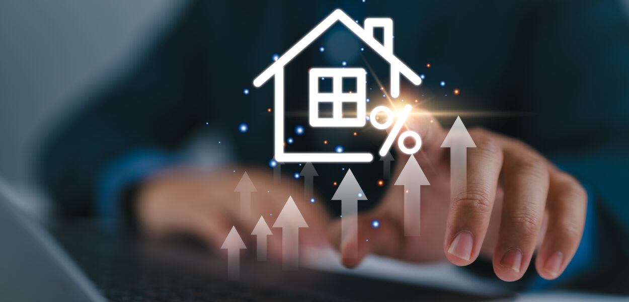 Real estate investment concept. Man touch virtual house icon for analyzing mortgage loan home and insurance real property mortgage. interest rate, Investment planning, business real estate.