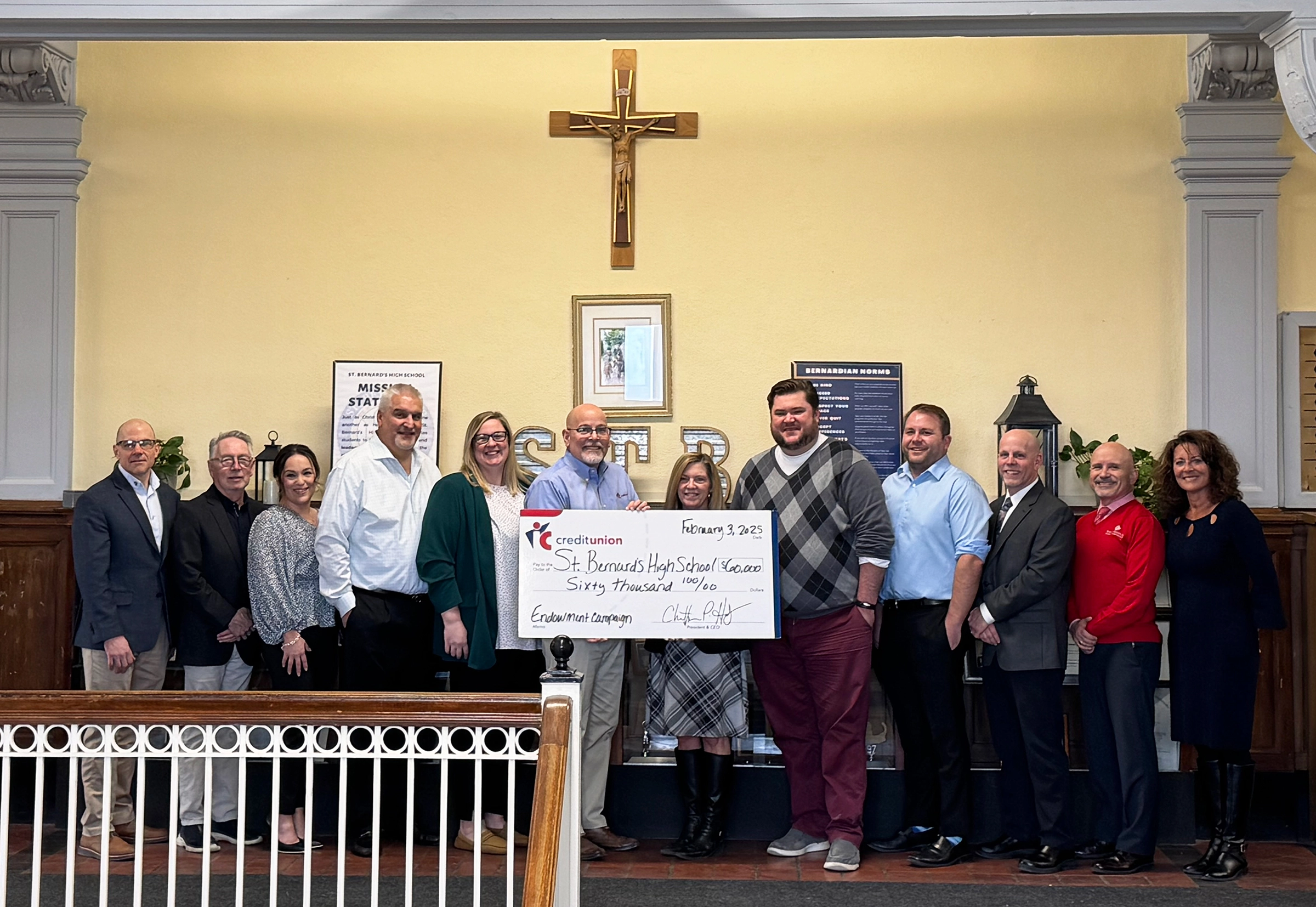 St. Bernard’s High School Endowment Receiving Check